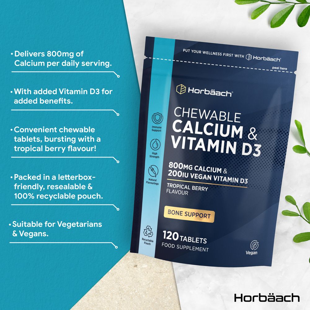 A hand holds a bulk-scale bottle of 120 vegan chewable Calcium and Vitamin D3 tablets, showcasing supplement quantity.