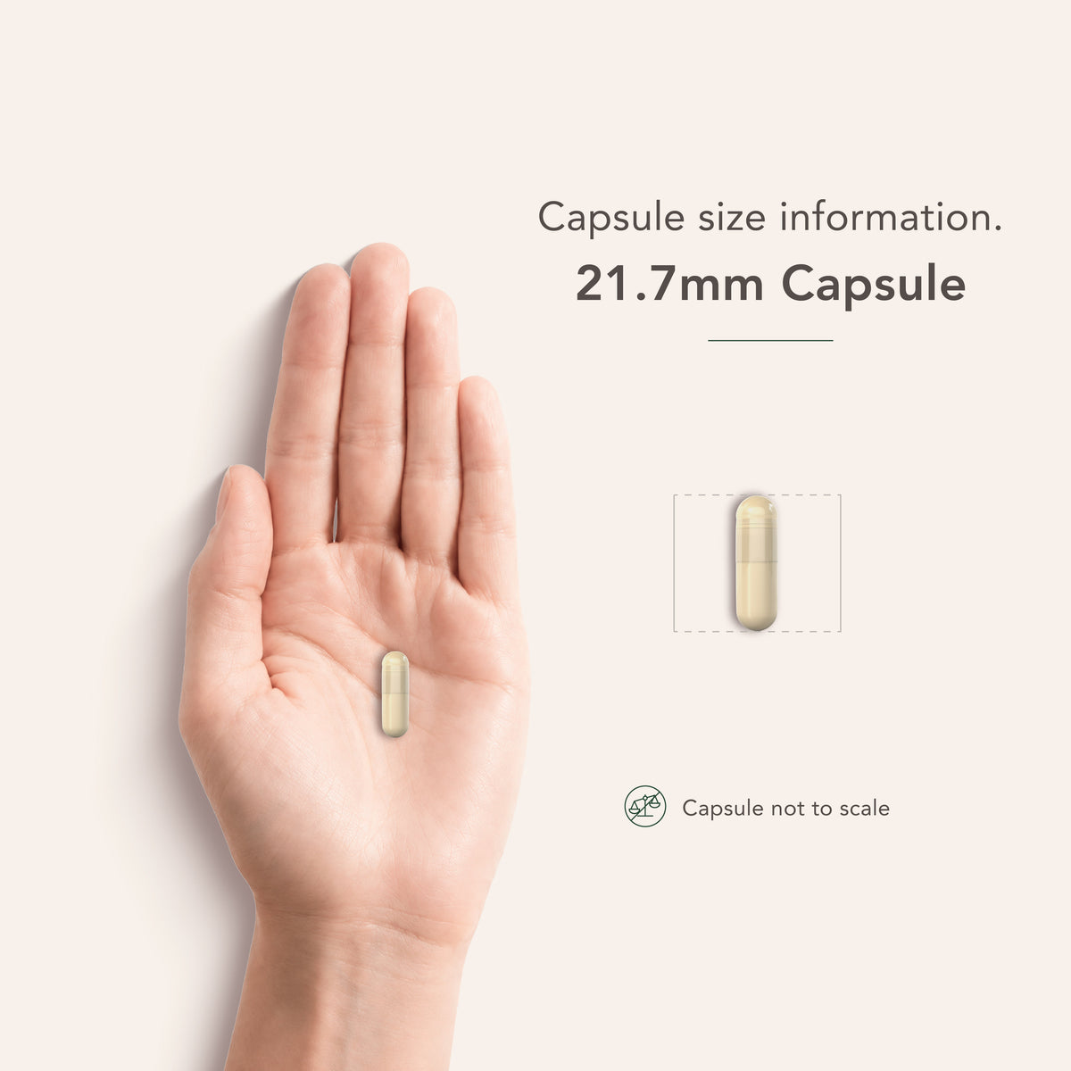 A 21.7mm capsule is shown resting in the open palm of a hand, illustrating its size for scale.