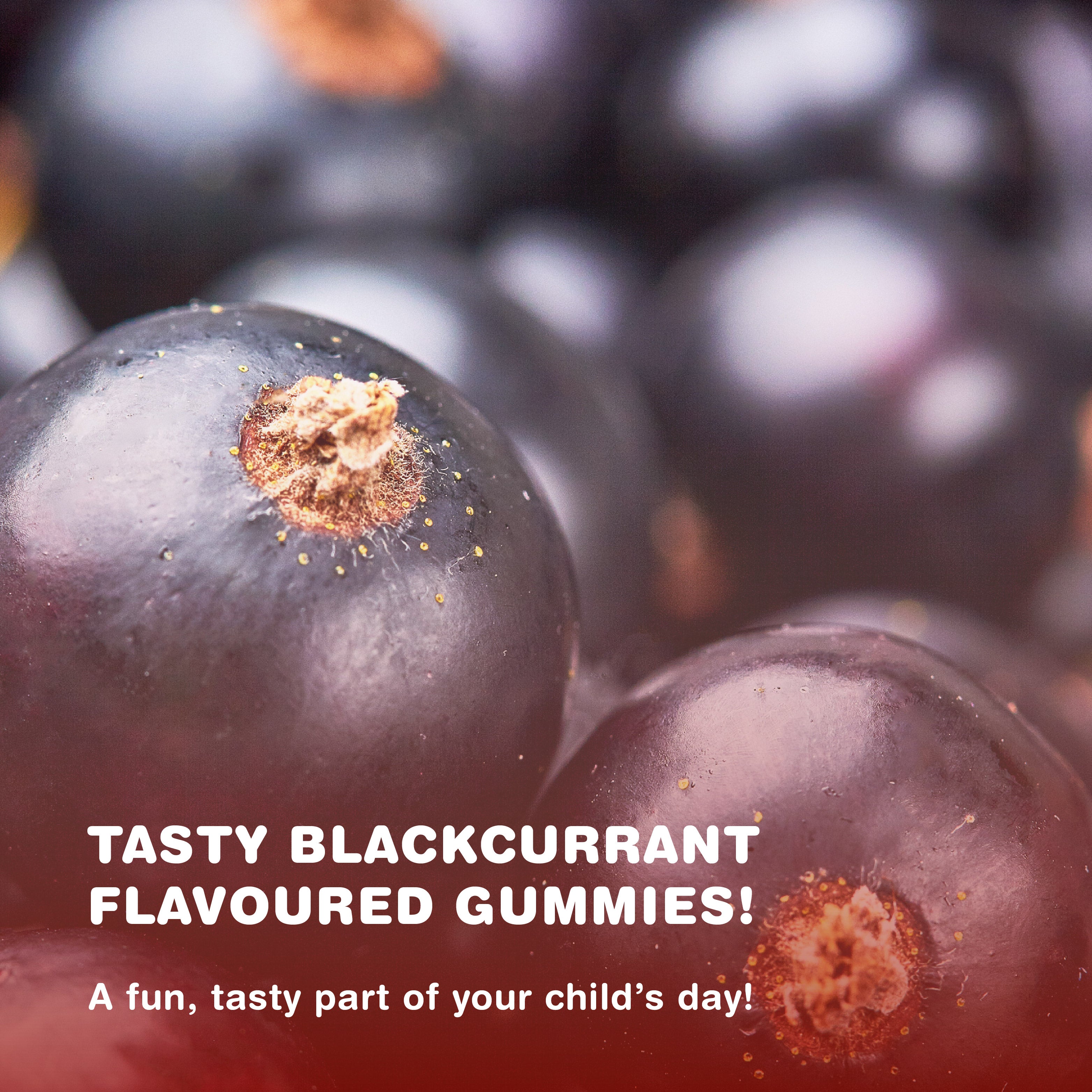Close-up of blackcurrants with text 'TASTY BLACKCURRANT FLAVOURED GUMMIES! A fun, tasty part of your child's day!'