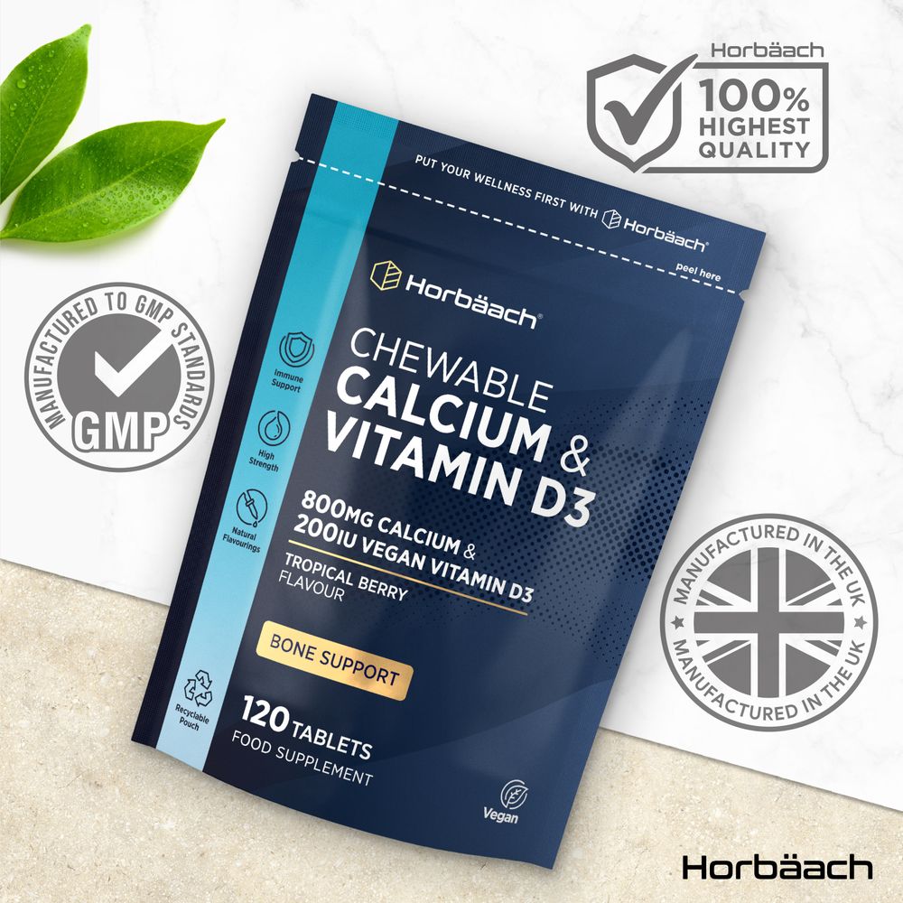 Hand holding a bottle of vegan chewable calcium and vitamin D3, containing 120 tablets, suitable for a plant-based diet.