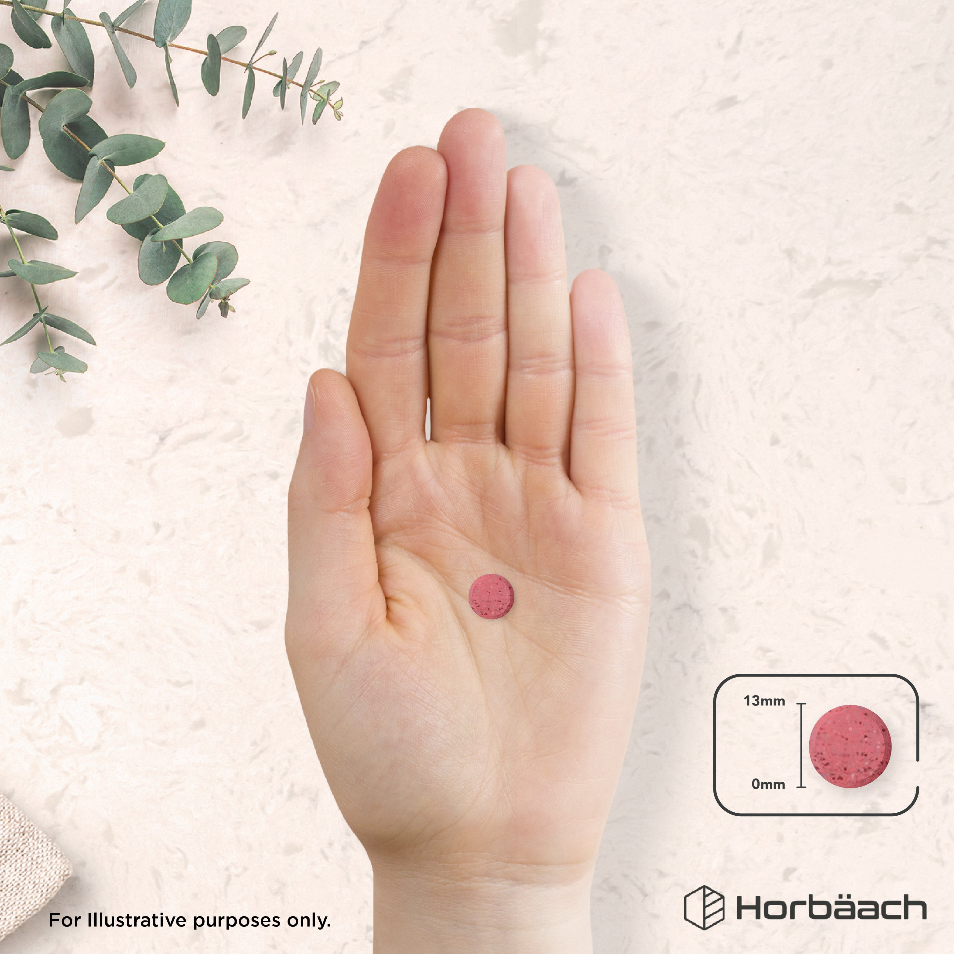 A pink circular tablet is held in a hand. An inset graphic shows the tablet with a 13mm diameter and 0mm thickness.