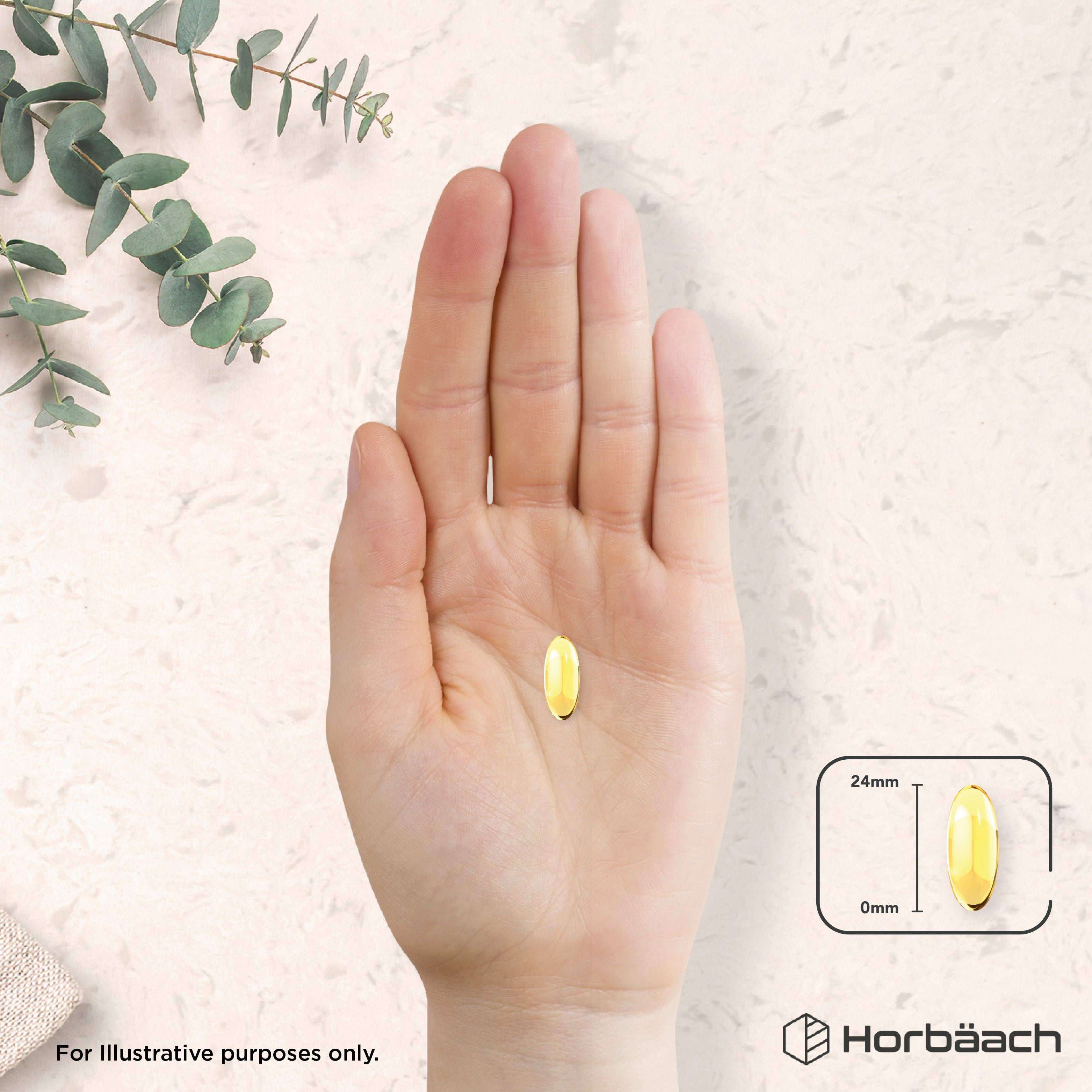 Hand holding a 24mm long MCT Oil softgel on a bulk scale.