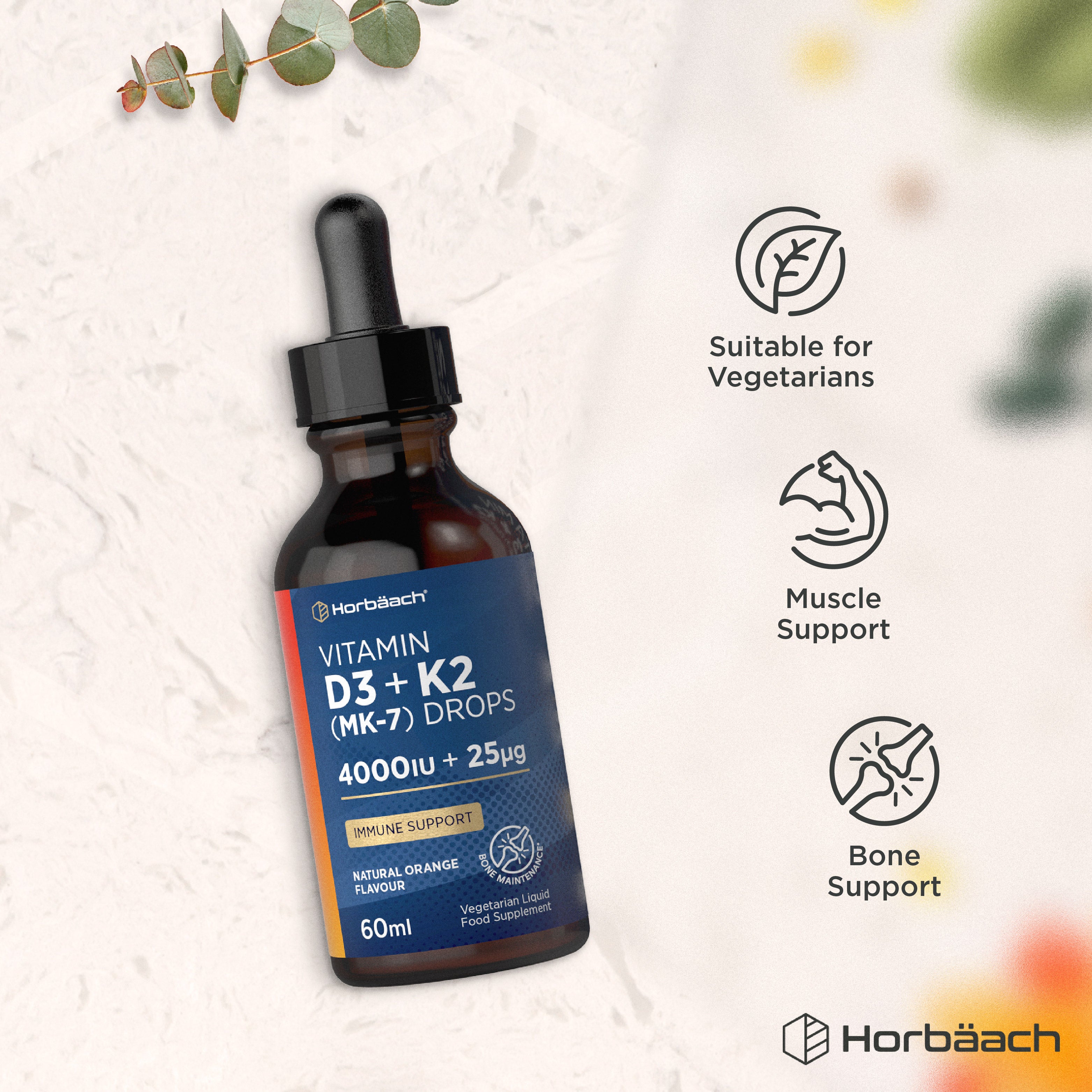 Vitamin D3 + K2 Drops bottle with icons indicating suitability for vegetarians, muscle support, and bone support.