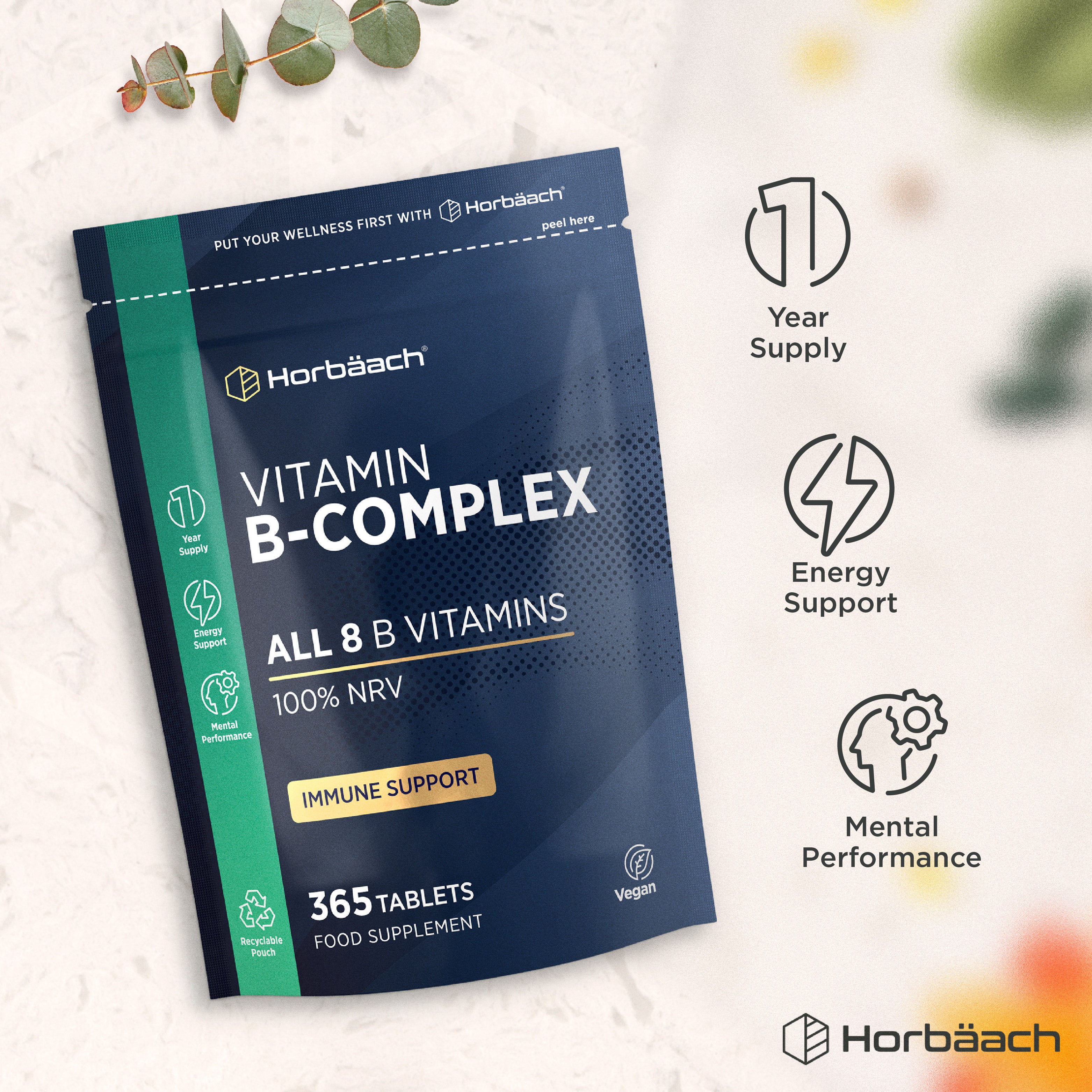 Vitamin B Complex bottle with icons indicating a year supply, energy support, mental performance, recyclable pouch, vegan.