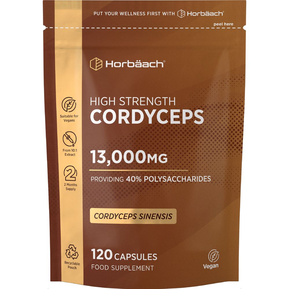 Hand holding a pouch of Cordyceps 13,000mg, containing 120 vegan capsules.