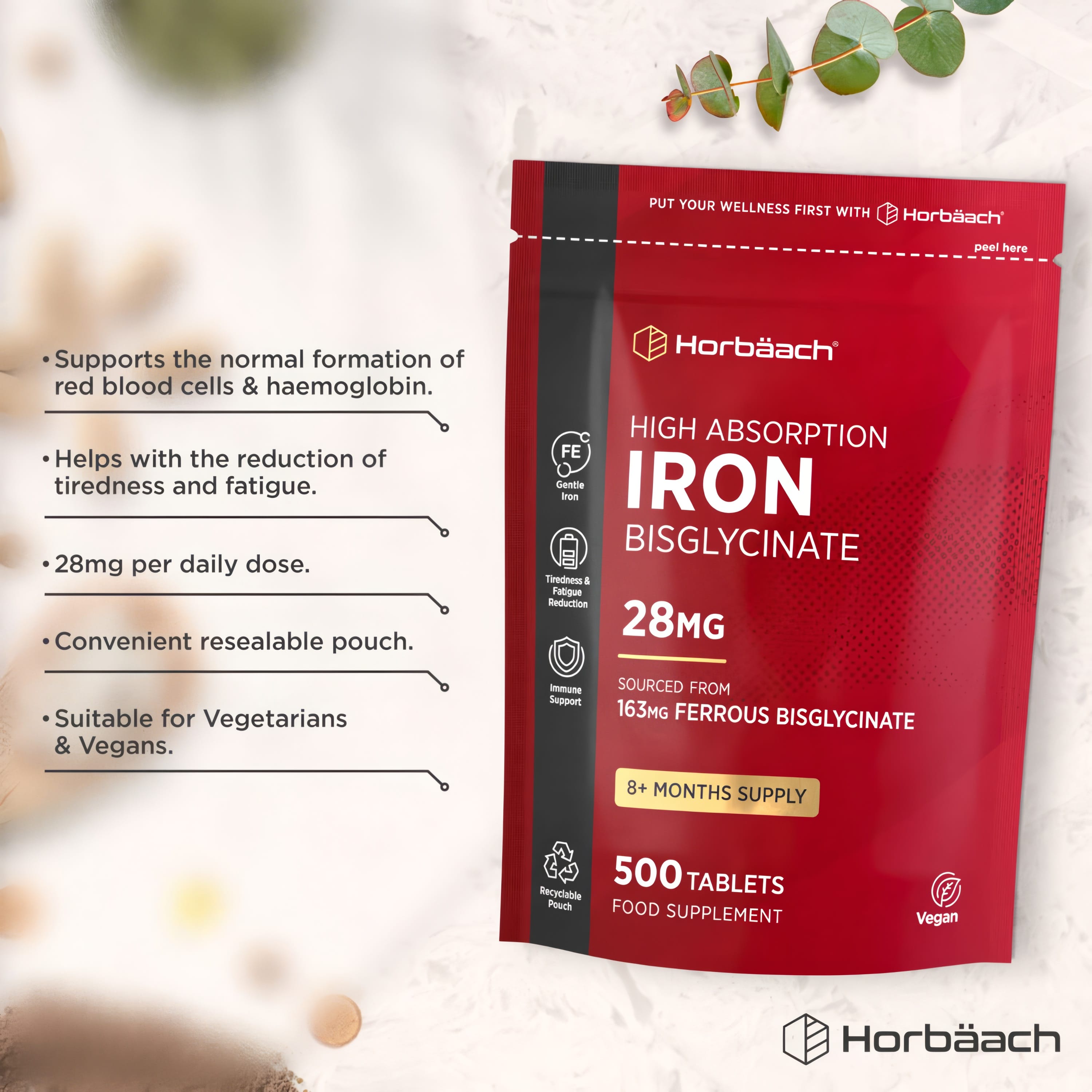 Product highlights graphic stating supports red blood cells/hemoglobin, reduces tiredness/fatigue, 28mg daily, pouch, vegan-friendly.
