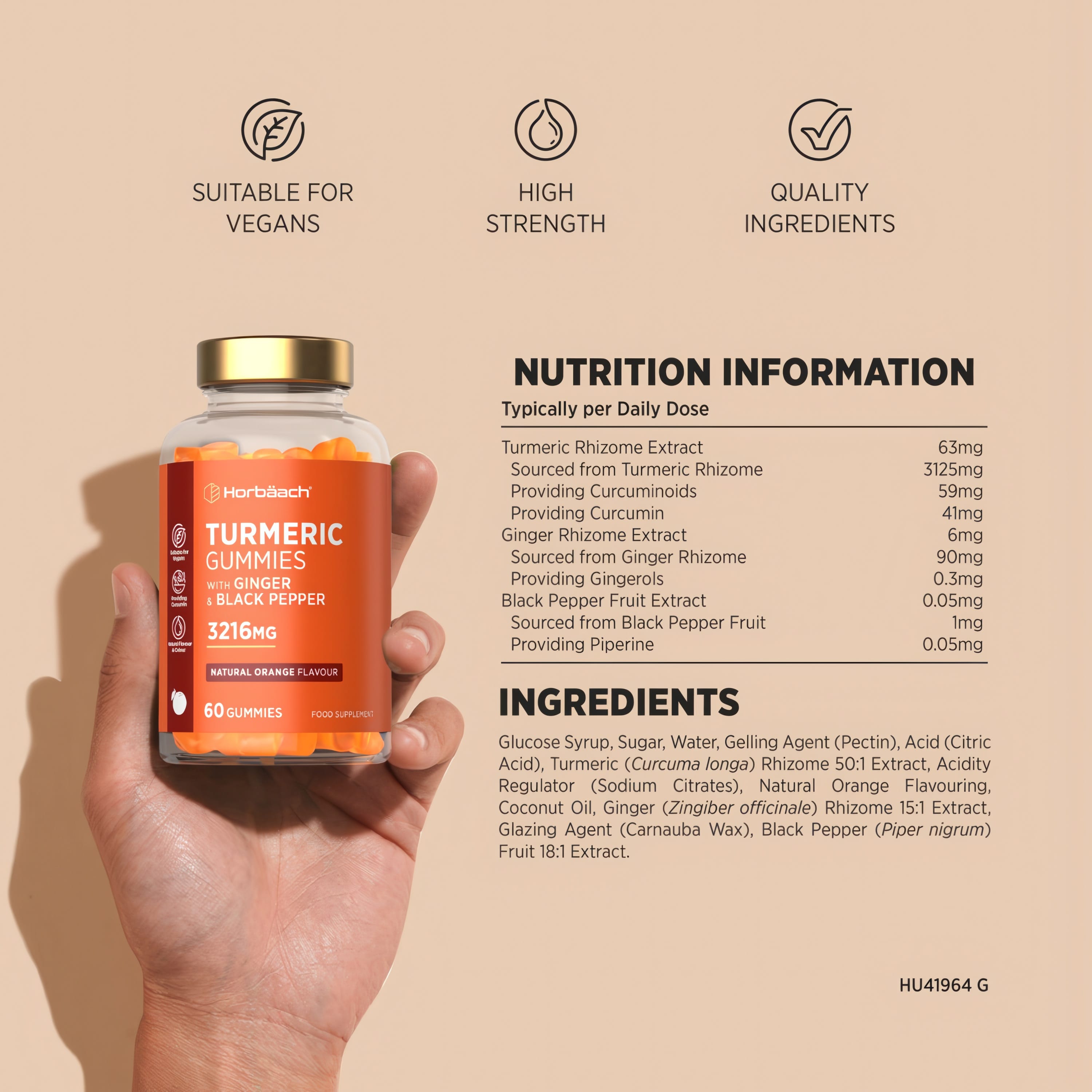 An adult hand holds Turmeric Gummies with Ginger & Black Pepper, 3216mg, Natural Orange. Vegan and high strength nutrition.