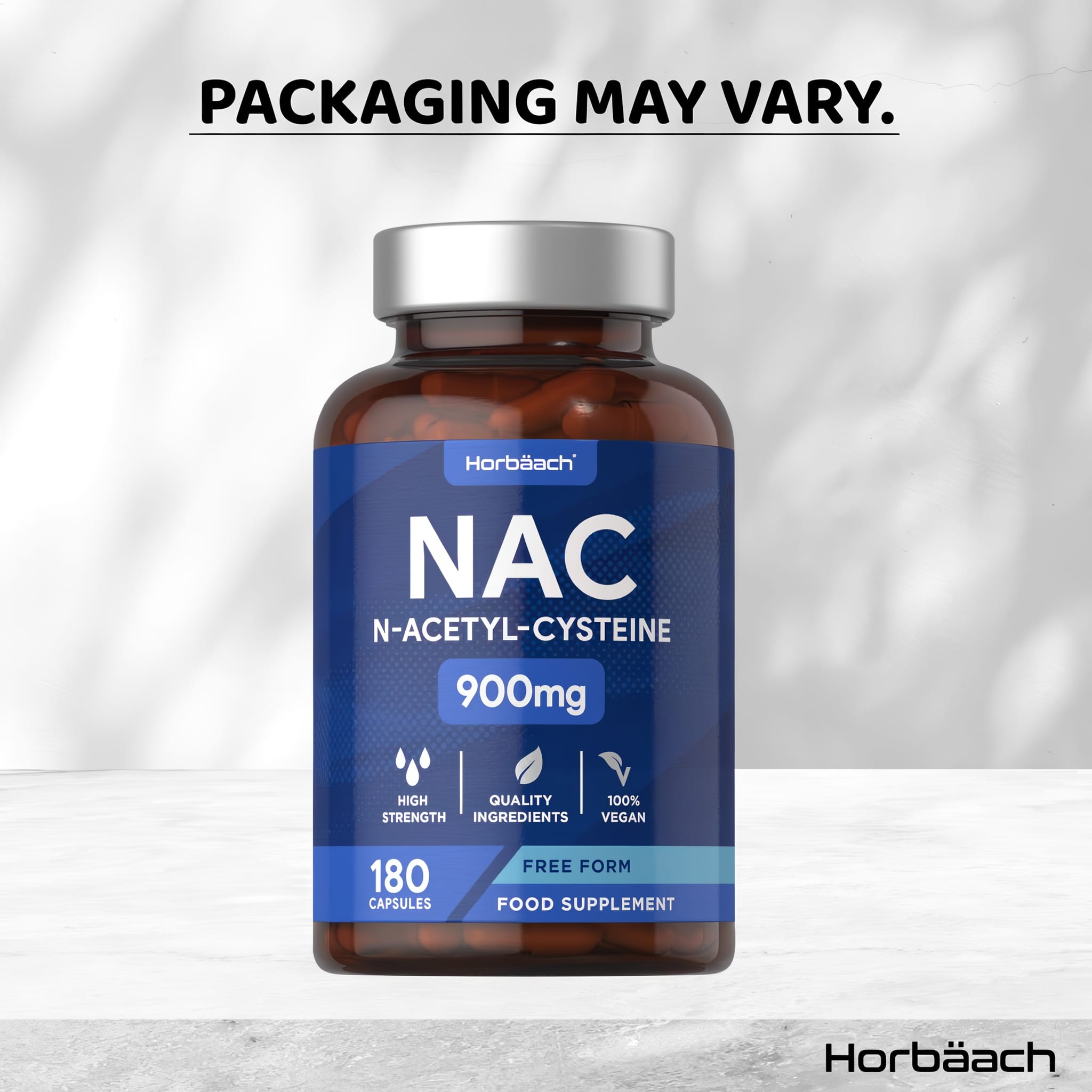 NAC N-Acetyl-Cysteine supplement with 900mg per capsule, available in a bottle of 180 capsules, shown on a hand scale.