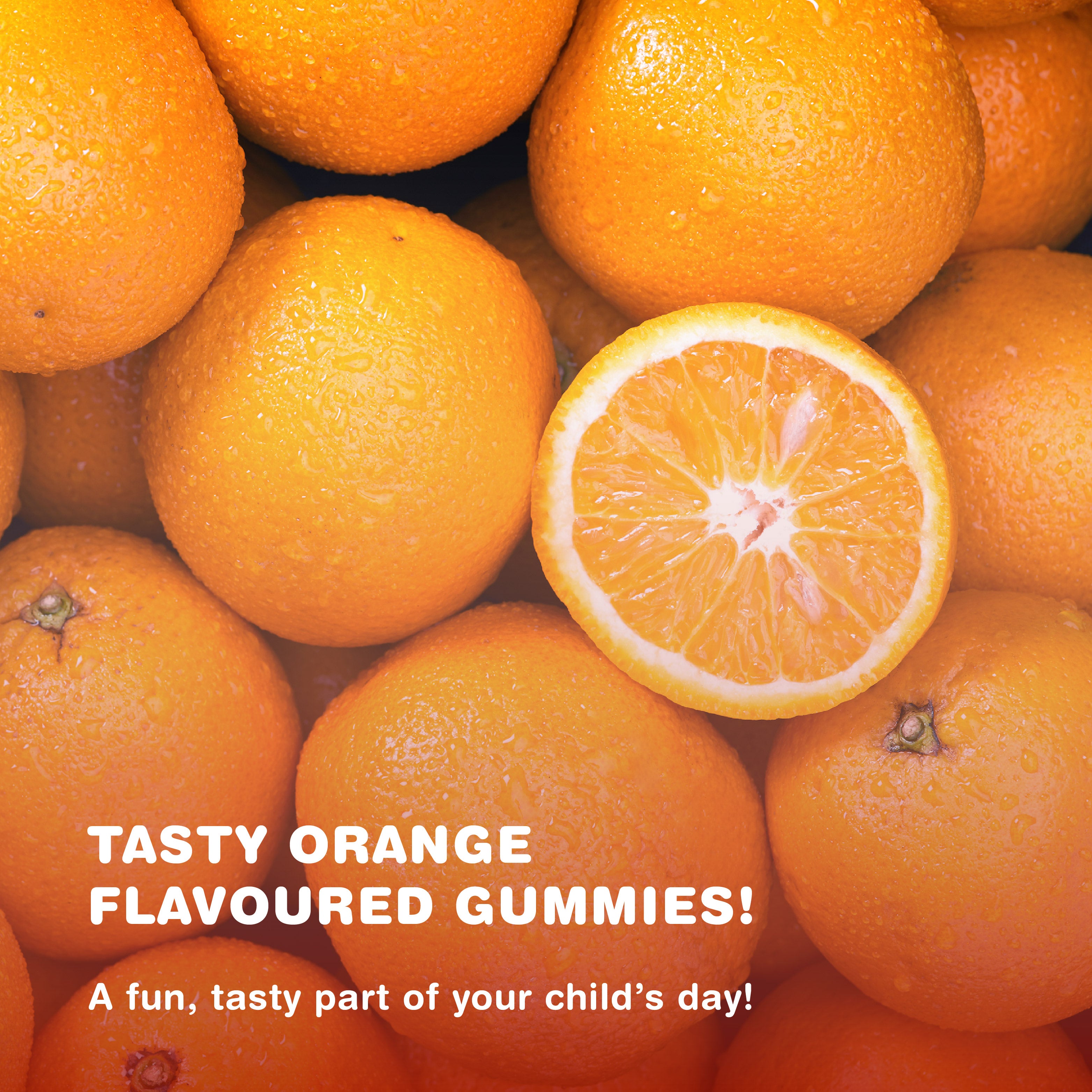 Fresh oranges with one sliced open. Text reads 'TASTY ORANGE FLAVOURED GUMMIES! A fun, tasty part of your child's day!'
