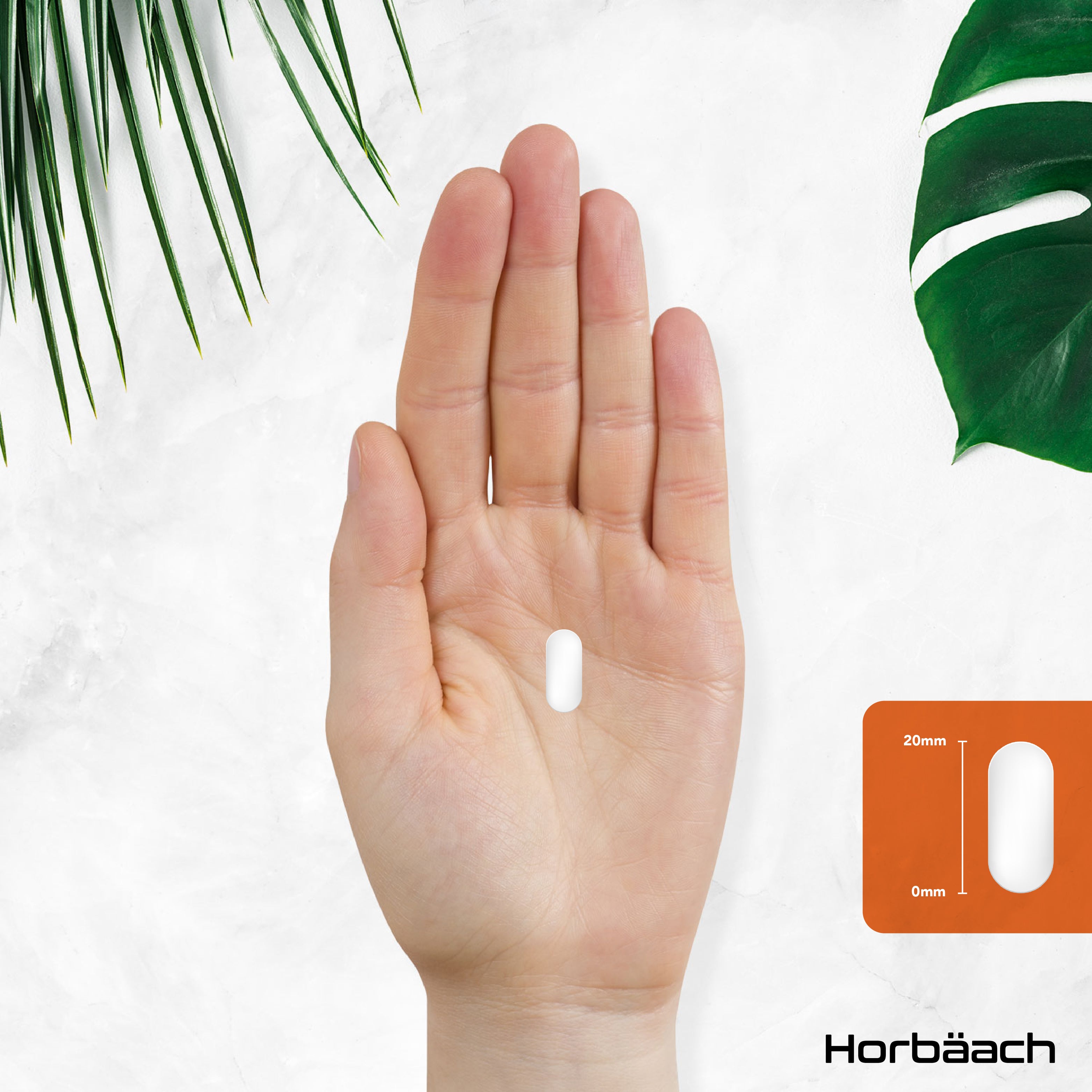 A white oval tablet rests on a hand, with a graphic showing its length as 20mm.