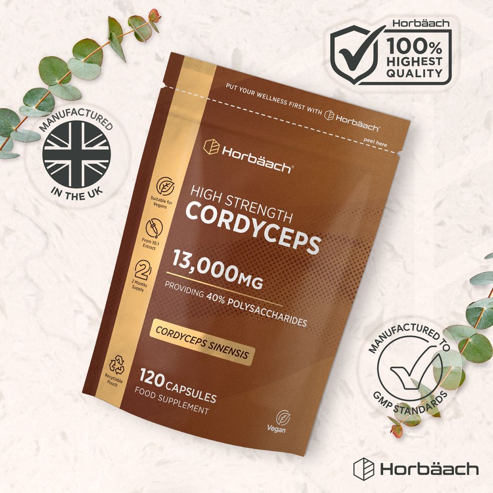 A hand holding a bottle of High Strength Cordyceps 13,000mg with 120 vegan capsules, indicating supplement weight and quantity.