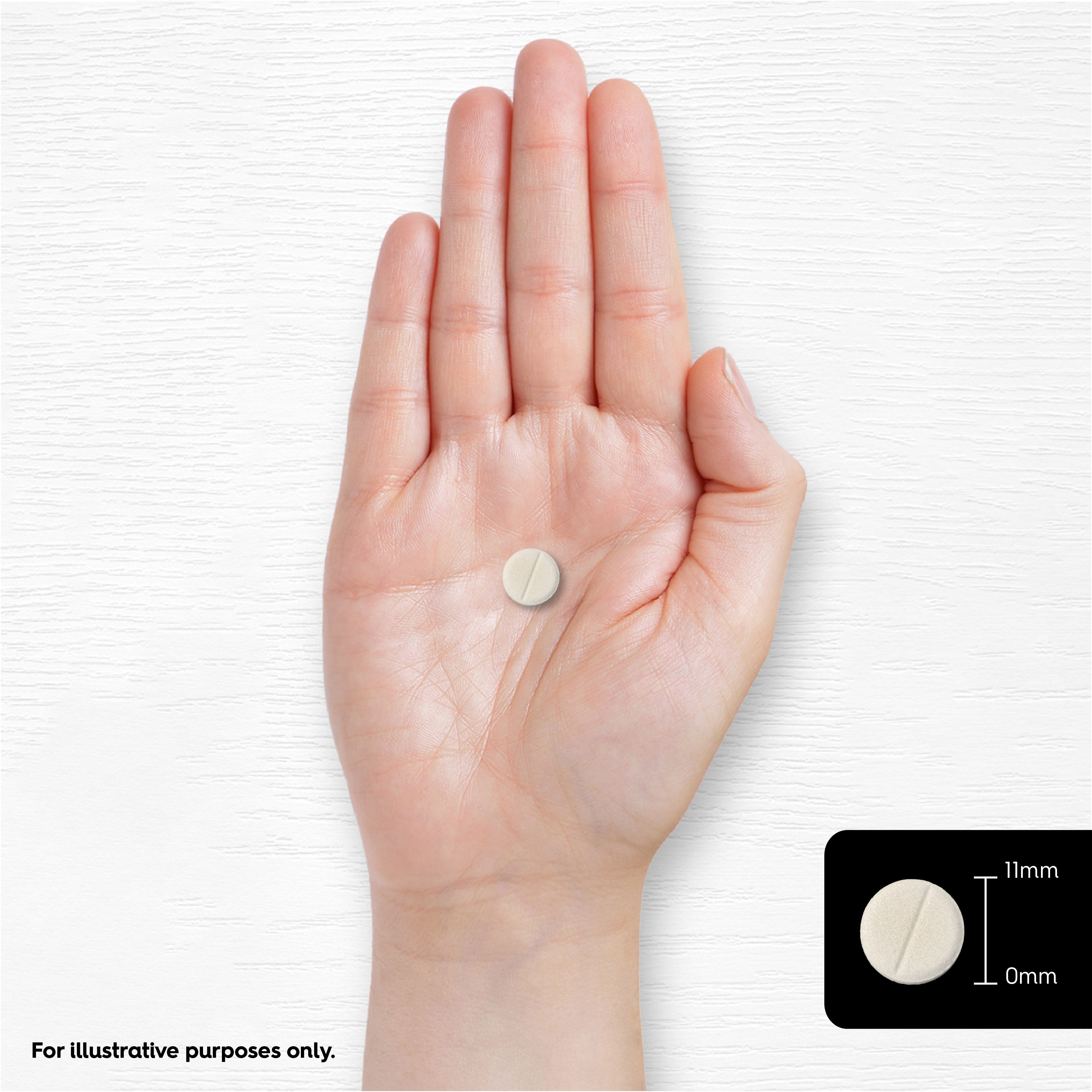 A hand holds a round, off-white tablet. Inset shows the tablet's size as 11mm.