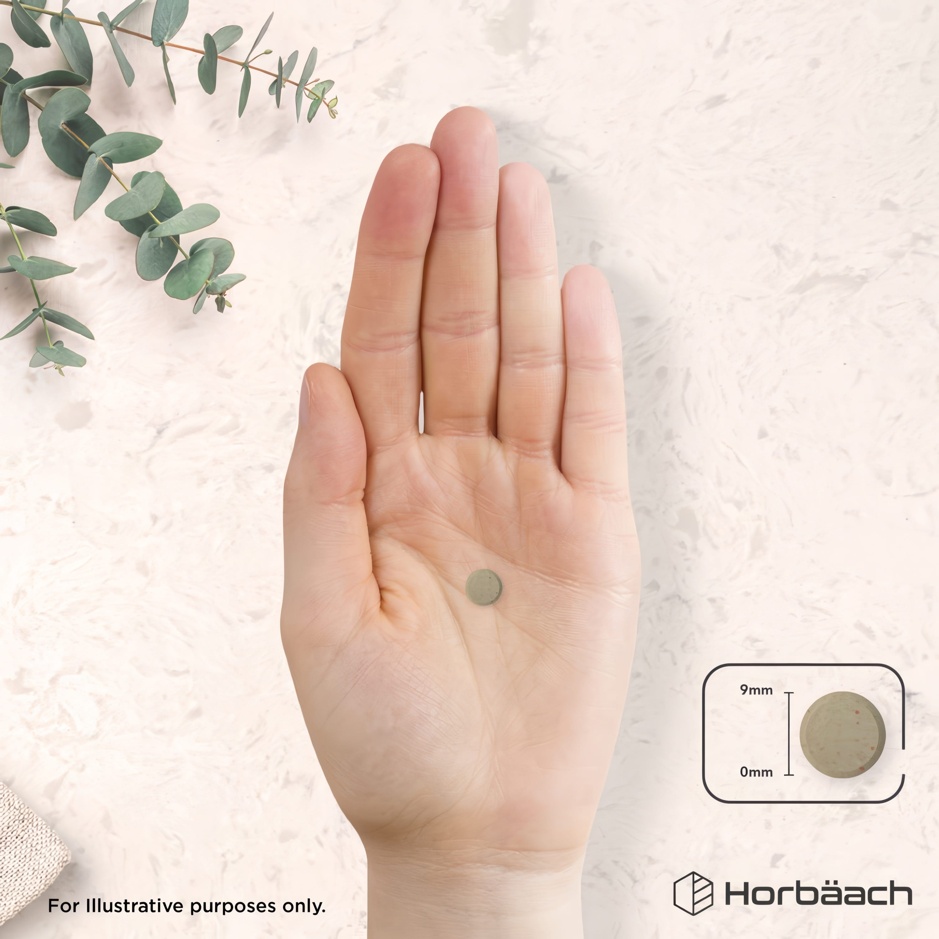 A 9mm vegan tablet of Iron Bisglycinate 28mg is held in a hand.