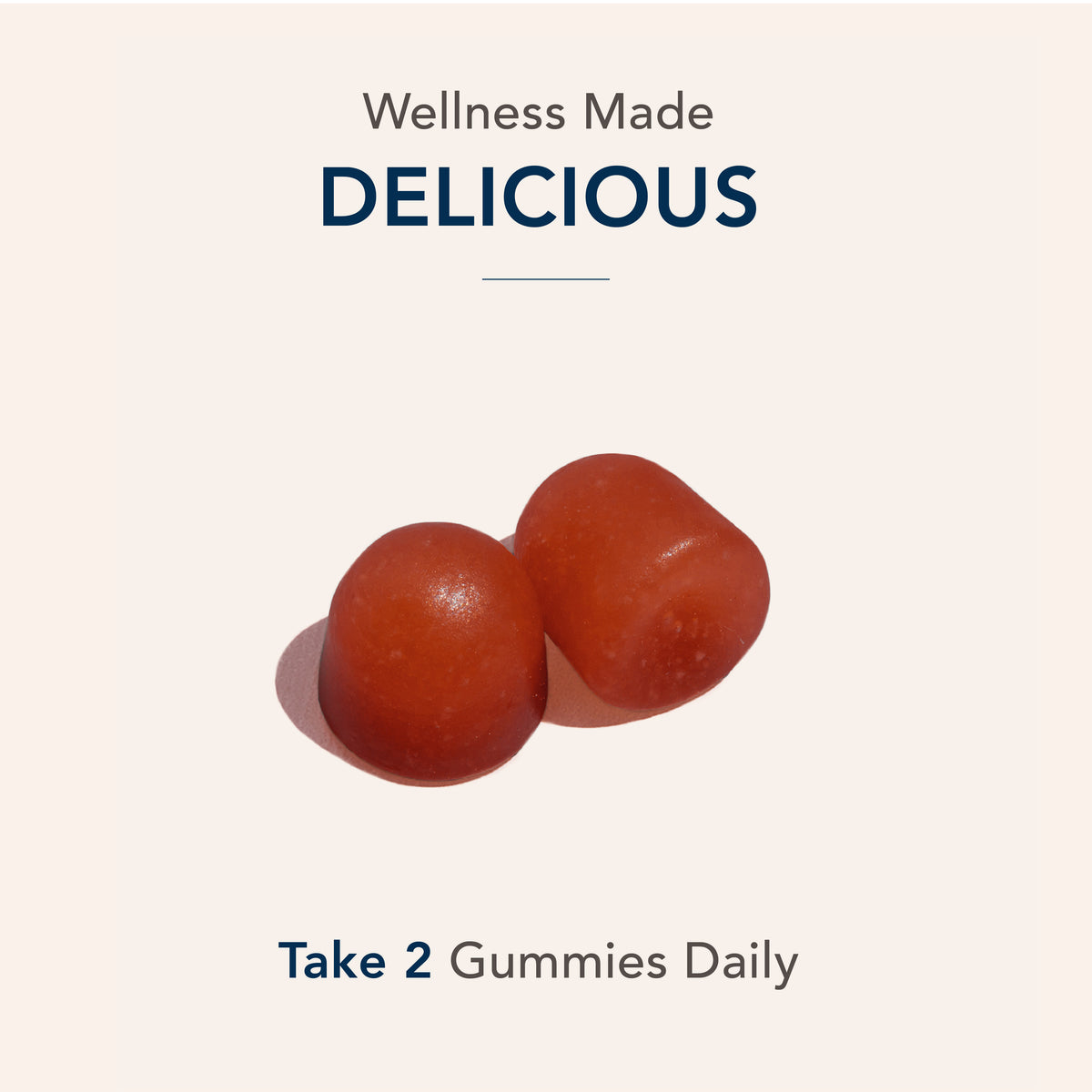 Two red HU Men's Multivitamin Gummies. Text reads 'Wellness Made DELICIOUS' and 'Take 2 Gummies Daily'.
